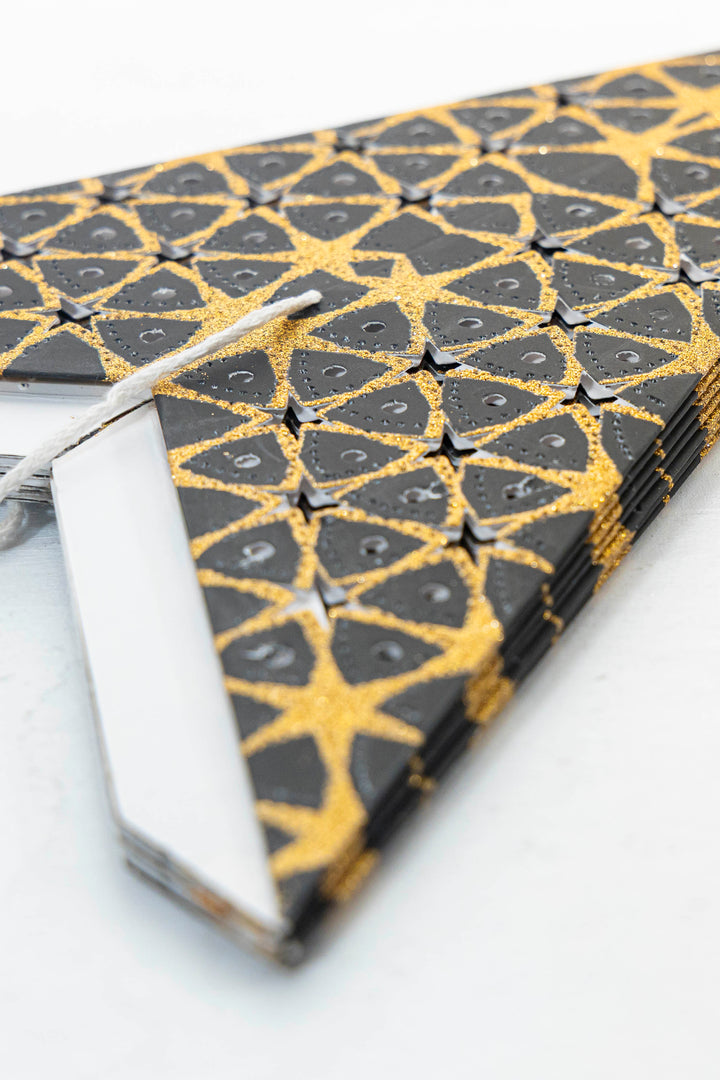 Glitzer Stern in SCHWARZ GOLD