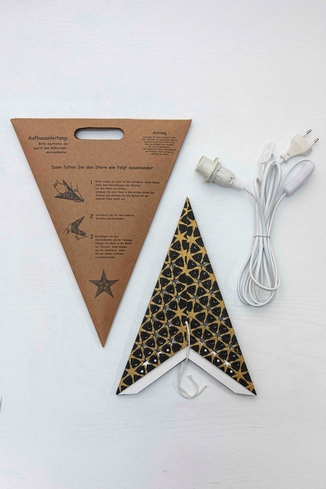 Glitzer Stern in SCHWARZ GOLD